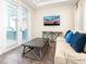 Living room with sofa, coffee table, and TV at 8035 Surf St, Kissimmee, FL 34747
