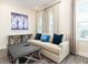 Living room with sofa and arm chair at 8035 Surf St, Kissimmee, FL 34747