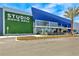 Studio Movie Grill building exterior with lush greenery at 8035 Surf St, Kissimmee, FL 34747
