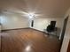 Large living room with laminate flooring and ceiling fan at 8568 Park Highland Dr, Orlando, FL 32818