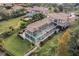 An aerial view of a luxury home with pool, spa, and backyard at 9301 Tibet Pointe Cir, Windermere, FL 34786