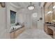 Spa-like bathroom featuring a freestanding tub and walk-in shower at 9301 Tibet Pointe Cir, Windermere, FL 34786