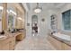 Elegant bathroom with double vanities, soaking tub, and separate shower at 9301 Tibet Pointe Cir, Windermere, FL 34786