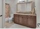 Bathroom with a vanity, toilet and bathtub at 9301 Tibet Pointe Cir, Windermere, FL 34786