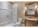 Elegant bathroom with a glass shower and ornate vanity at 9301 Tibet Pointe Cir, Windermere, FL 34786