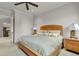 Bedroom featuring wooden furniture and neutral decor at 9301 Tibet Pointe Cir, Windermere, FL 34786