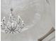 Crystal chandelier with ornate detailing at 9301 Tibet Pointe Cir, Windermere, FL 34786