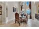 Elegant dining room featuring a formal table setting and a stunning chandelier at 9301 Tibet Pointe Cir, Windermere, FL 34786
