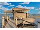 Covered boat dock with lift and ample space for entertaining at 9301 Tibet Pointe Cir, Windermere, FL 34786