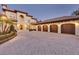 Home with four-car garage and paved driveway at 9301 Tibet Pointe Cir, Windermere, FL 34786