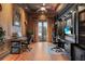Bright home office with built-in bookcases and two work stations at 9301 Tibet Pointe Cir, Windermere, FL 34786