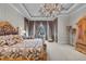 Main bedroom with plush carpeting and large windows at 9301 Tibet Pointe Cir, Windermere, FL 34786
