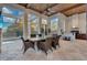 Enjoy this outdoor kitchen and dining space at 9301 Tibet Pointe Cir, Windermere, FL 34786