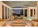 View of a pool, spa and fire pit from the patio seating area at 9301 Tibet Pointe Cir, Windermere, FL 34786