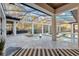 Relaxing pool area with fire pit and serene views at 9301 Tibet Pointe Cir, Windermere, FL 34786