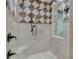 Large walk-in shower with a diamond patterned tile design at 9301 Tibet Pointe Cir, Windermere, FL 34786