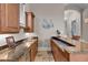 Wet bar with granite countertop and ample cabinet space at 9301 Tibet Pointe Cir, Windermere, FL 34786