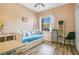 Small bedroom with daybed and built in shelving at 9447 Myrtle Creek Ln # 113, Orlando, FL 32832