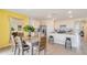 Kitchen and dining area with modern table and chairs at 1300 Hanoverian Dr, Lake Alfred, FL 33850