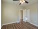 Charming bedroom with ceiling fan and walk-in closet at 1921 Rockwell Rd, Orlando, FL 32808