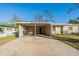 View of a carport attached to a single story home at 1921 Rockwell Rd, Orlando, FL 32808