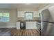 Kitchen with granite countertops and stainless steel appliances at 1921 Rockwell Rd, Orlando, FL 32808