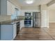 Updated kitchen with stainless steel appliances and granite at 1921 Rockwell Rd, Orlando, FL 32808