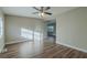 Spacious living room with hardwood floors and natural light at 1921 Rockwell Rd, Orlando, FL 32808