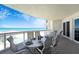 Oceanfront balcony with a table, chairs, and stunning view at 1925 S Atlantic Ave # 502, Daytona Beach, FL 32118