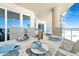 Spacious balcony with an ocean view and dining furniture at 1925 S Atlantic Ave # 502, Daytona Beach, FL 32118