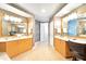 Double vanity bathroom with ample counter space and storage at 1925 S Atlantic Ave # 502, Daytona Beach, FL 32118