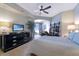 Main bedroom with TV, dresser, and ocean view at 1925 S Atlantic Ave # 502, Daytona Beach, FL 32118