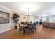 Elegant dining room with hardwood floors and chandelier at 1925 S Atlantic Ave # 502, Daytona Beach, FL 32118