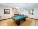 Relaxing game room with pool table, comfortable seating area at 1925 S Atlantic Ave # 502, Daytona Beach, FL 32118