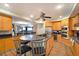Open concept kitchen with breakfast bar and hardwood floors at 1925 S Atlantic Ave # 502, Daytona Beach, FL 32118