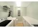 Laundry room with washer, dryer, and additional counter space at 1925 S Atlantic Ave # 502, Daytona Beach, FL 32118