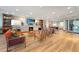 Condo lobby with fireplace, comfortable seating and large screen TV at 1925 S Atlantic Ave # 502, Daytona Beach, FL 32118