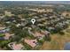 Aerial view showcasing a luxury home's location within an upscale gated neighborhood at 25510 High Hampton Cir, Sorrento, FL 32776