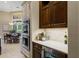 Kitchen with double ovens, a beverage cooler, and plenty of cabinet space at 25510 High Hampton Cir, Sorrento, FL 32776