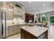Spacious kitchen with island, modern appliances, and plenty of natural light at 25510 High Hampton Cir, Sorrento, FL 32776