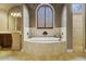 Elegant Primary bathroom featuring a soaking tub and separate shower at 25510 High Hampton Cir, Sorrento, FL 32776
