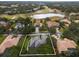 Aerial view highlighting the property boundaries and surrounding landscaping of the house at 25510 High Hampton Cir, Sorrento, FL 32776