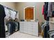 Large walk-in closet with built-in dresser and ample storage space at 25510 High Hampton Cir, Sorrento, FL 32776