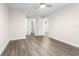 Spacious bedroom with wood-look floors and ceiling fan at 3034 Parkway Blvd # 204, Kissimmee, FL 34747