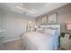 Comfortable main bedroom with ensuite bathroom access at 5338 Spoonflower Ct, Saint Cloud, FL 34771