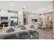 Modern kitchen boasts stainless steel appliances and an island with seating at 5338 Spoonflower Ct, Saint Cloud, FL 34771