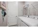 Laundry room with washer, dryer, and shelving at 5338 Spoonflower Ct, Saint Cloud, FL 34771