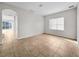 Neutral-toned dining room with tile floors and large windows at 1022 Whirlaway Dr, Kissimmee, FL 34744