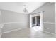 Bright dining room with tile floors and sliding glass doors leading to the patio at 1096 Ballyshannon Pkwy, Orlando, FL 32828