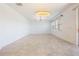 Open concept dining room with a modern chandelier at 12027 Language Way, Orlando, FL 32832